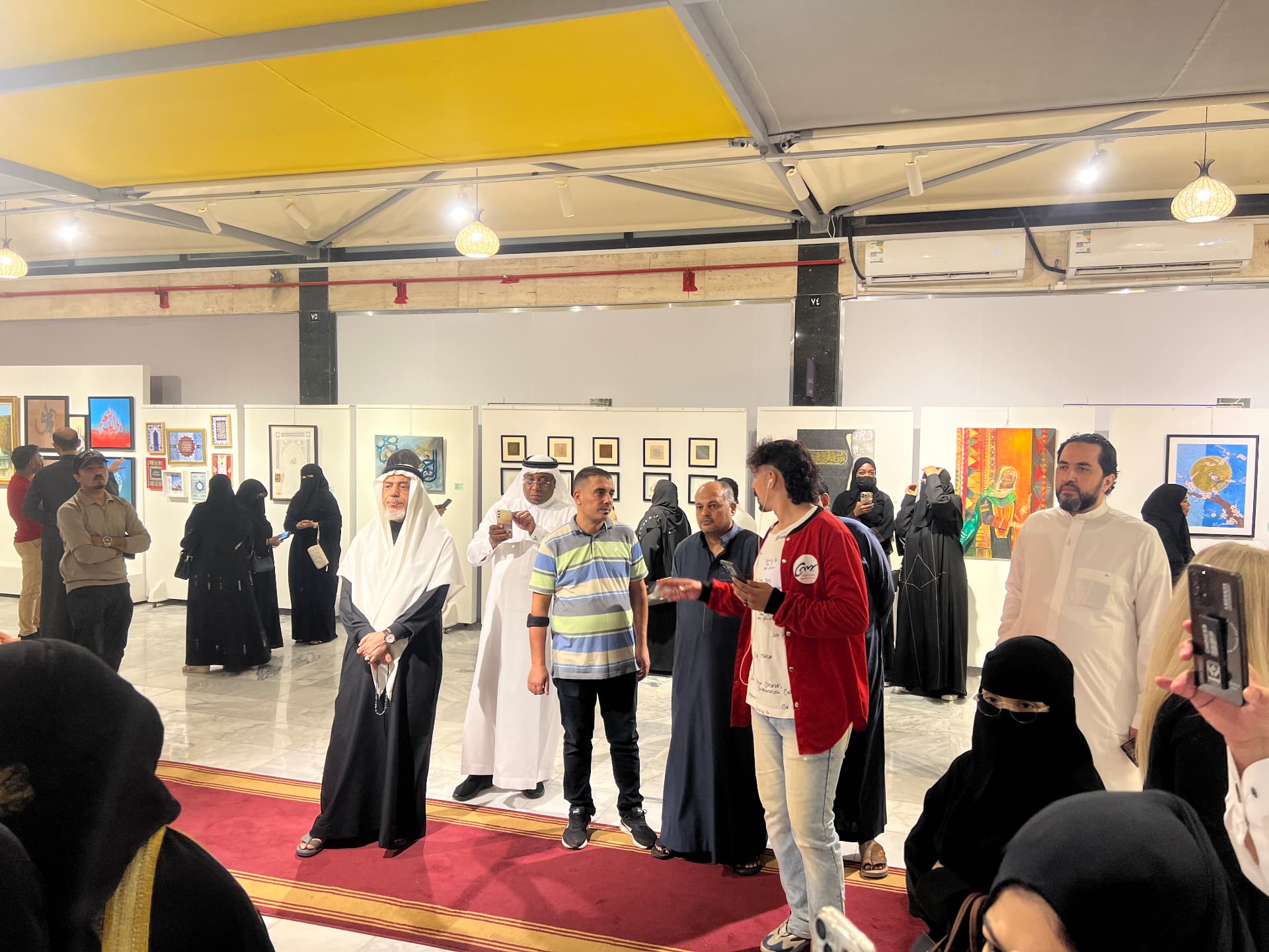 Visitors touring the calligraphy and painting displays