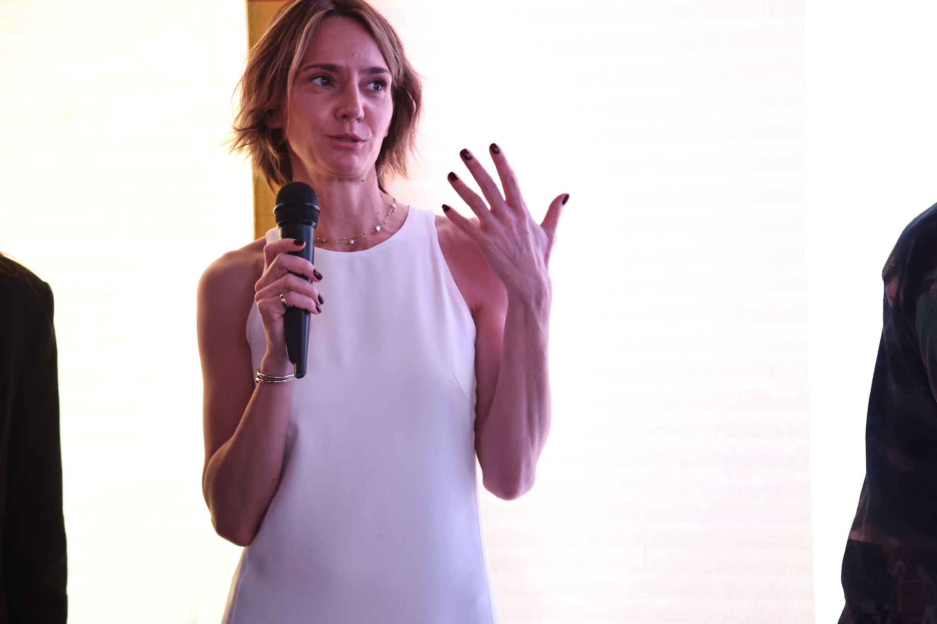 Curator speaking at an Art Privé salon