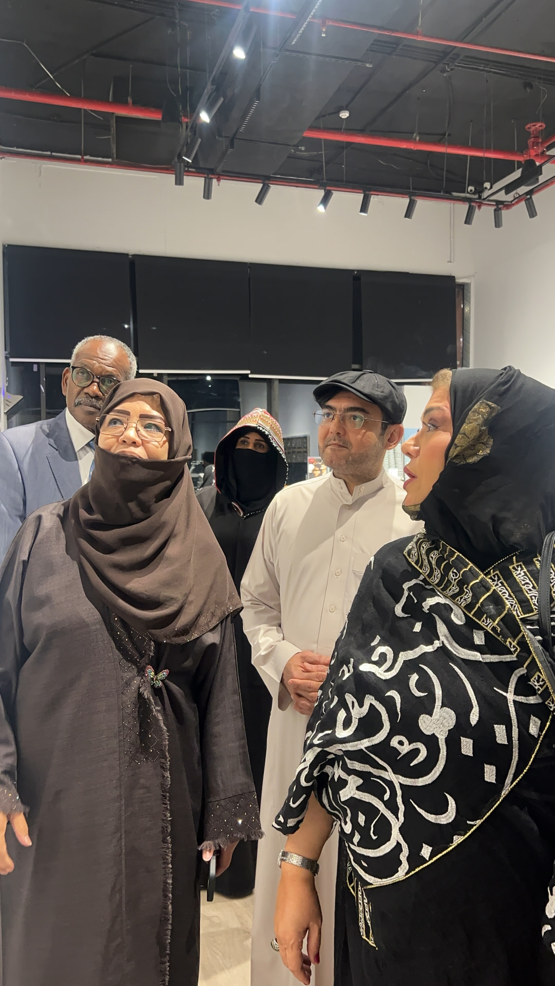 Guests viewing artworks during the programme