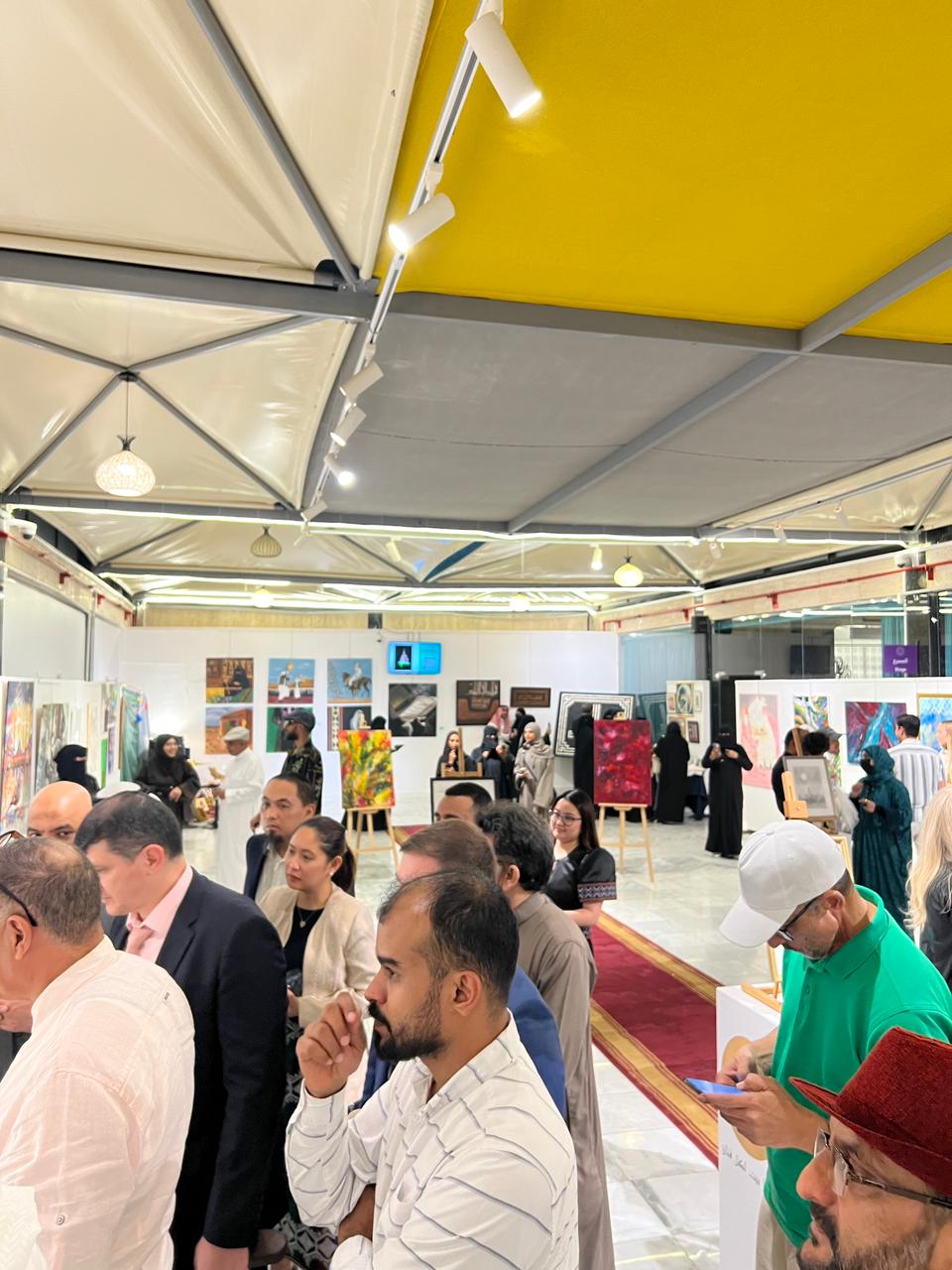 Crowded exhibition pavilion during the programme